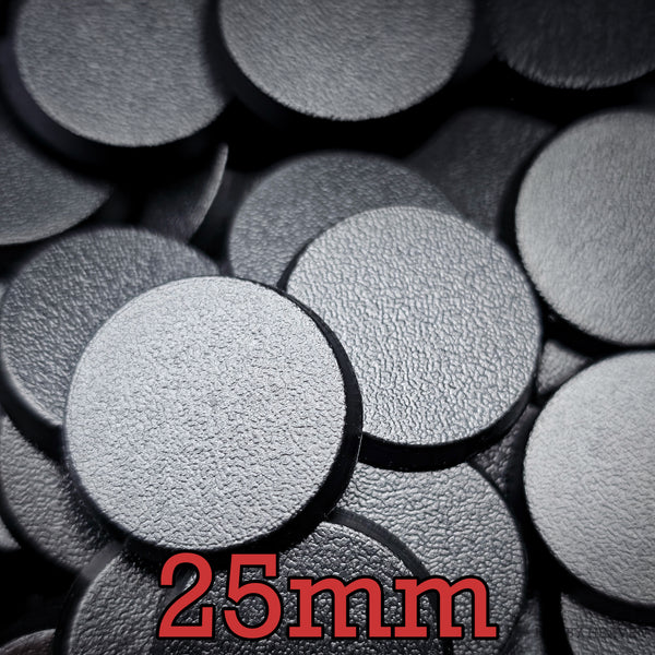 Top view of 25mm round ABS plastic bases for Warhammer miniatures, showing textured finish.