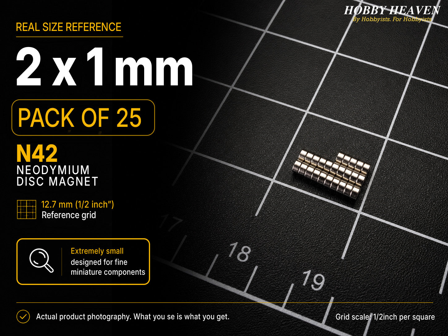 Pack of 25 - 2 x 1 mm N42 neodymium disc magnets in short stacked rows on a half-inch reference grid