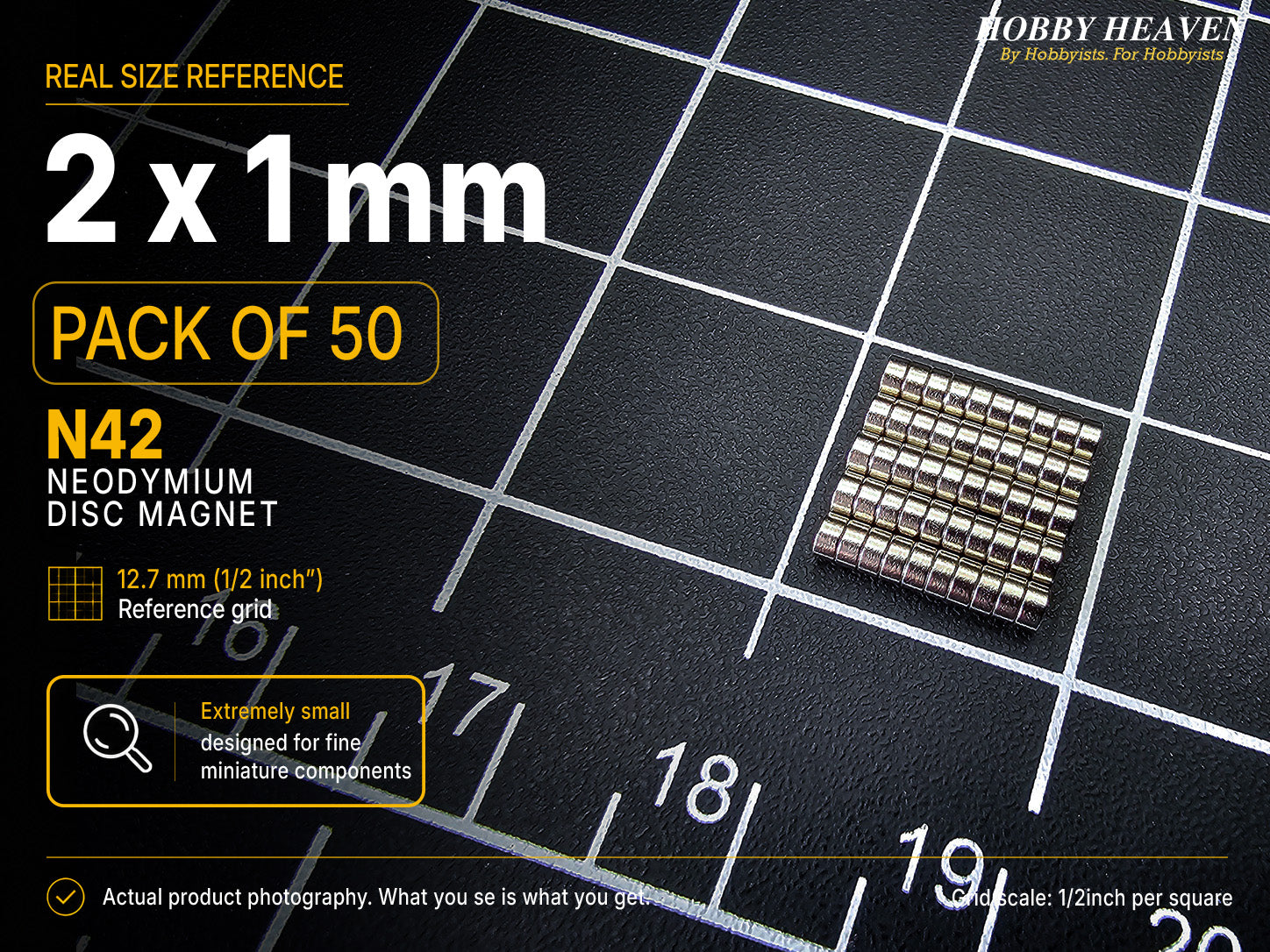 Pack of 50 - 2 x 1 mm N42 neodymium disc magnets arranged in five rows of ten on a half-inch reference grid
