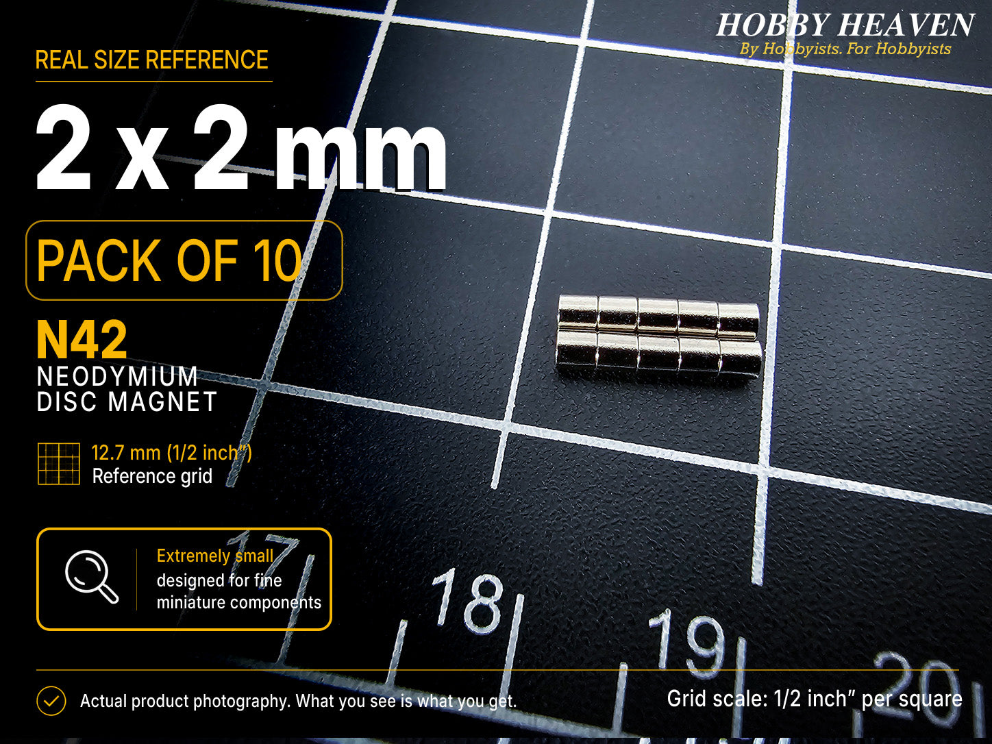 Pack of 10 - 2 x 2 mm N42 neodymium disc magnets in two stacked rows on a half-inch reference grid
