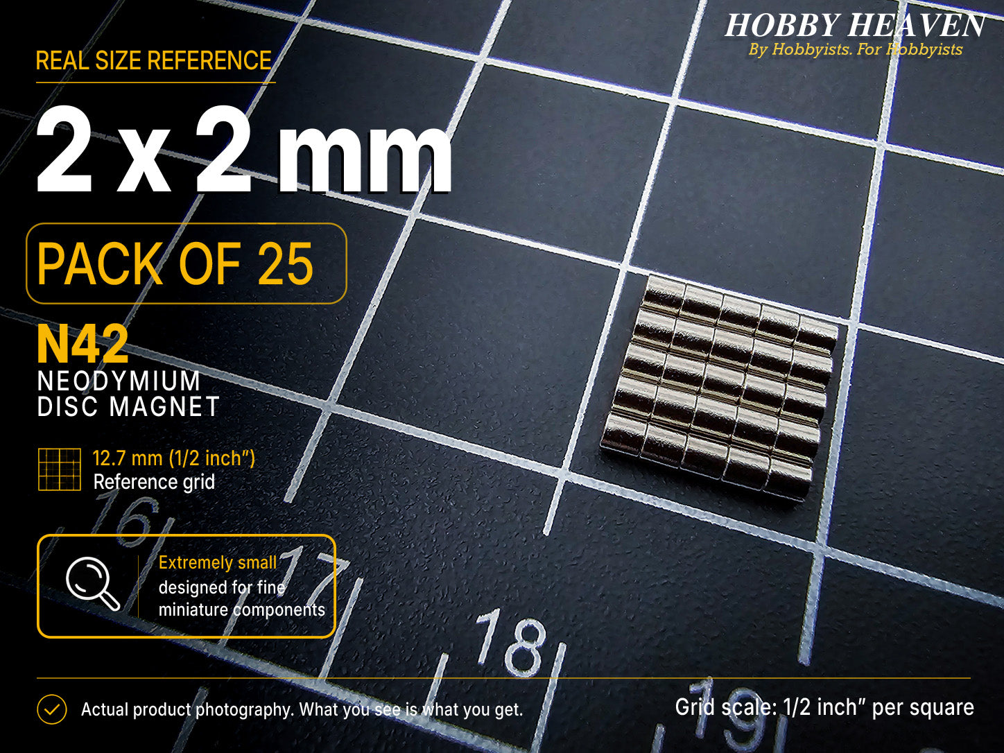 Pack of 25 - 2 x 2 mm N42 neodymium disc magnets in five stacked rows on a half-inch reference grid
