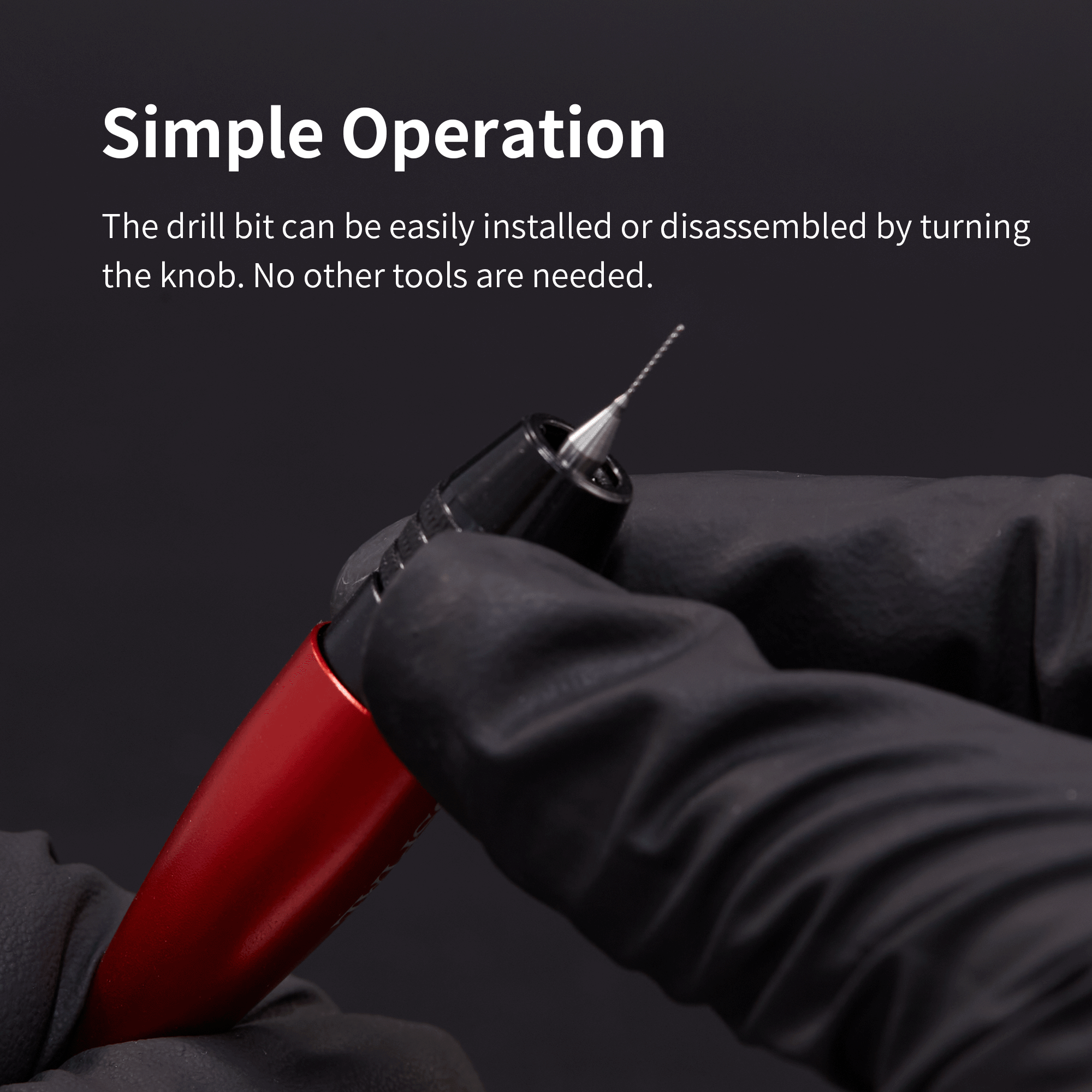 AT-VHDS simple bit installation by turning the chuck knob, gloved hand close-up