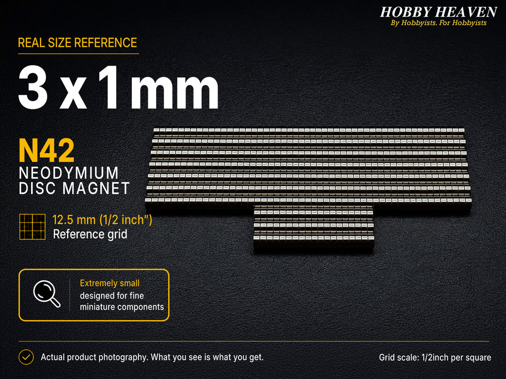 Stacked rows of 3 x 1 mm N42 neodymium disc magnets shown at real size on a half-inch reference grid
