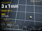 Pack of 1 - single 3 x 1 mm N42 neodymium disc magnet on a half-inch reference grid