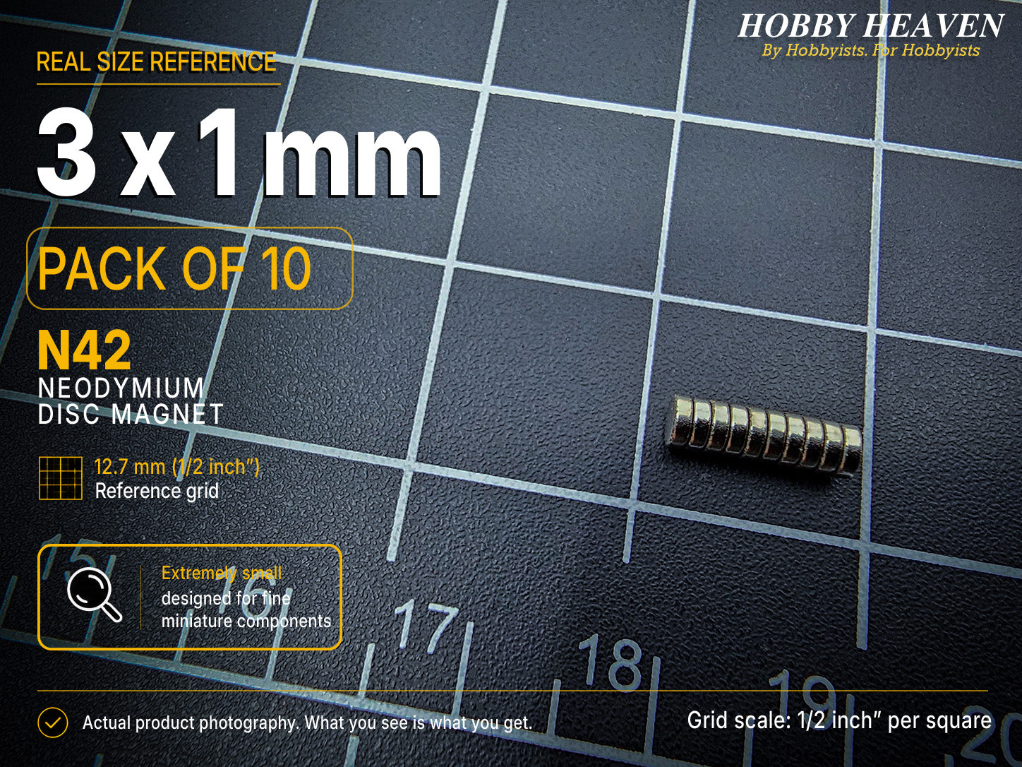 Pack of 10 - 3 x 1 mm N42 neodymium disc magnets stacked in a row on a half-inch reference grid