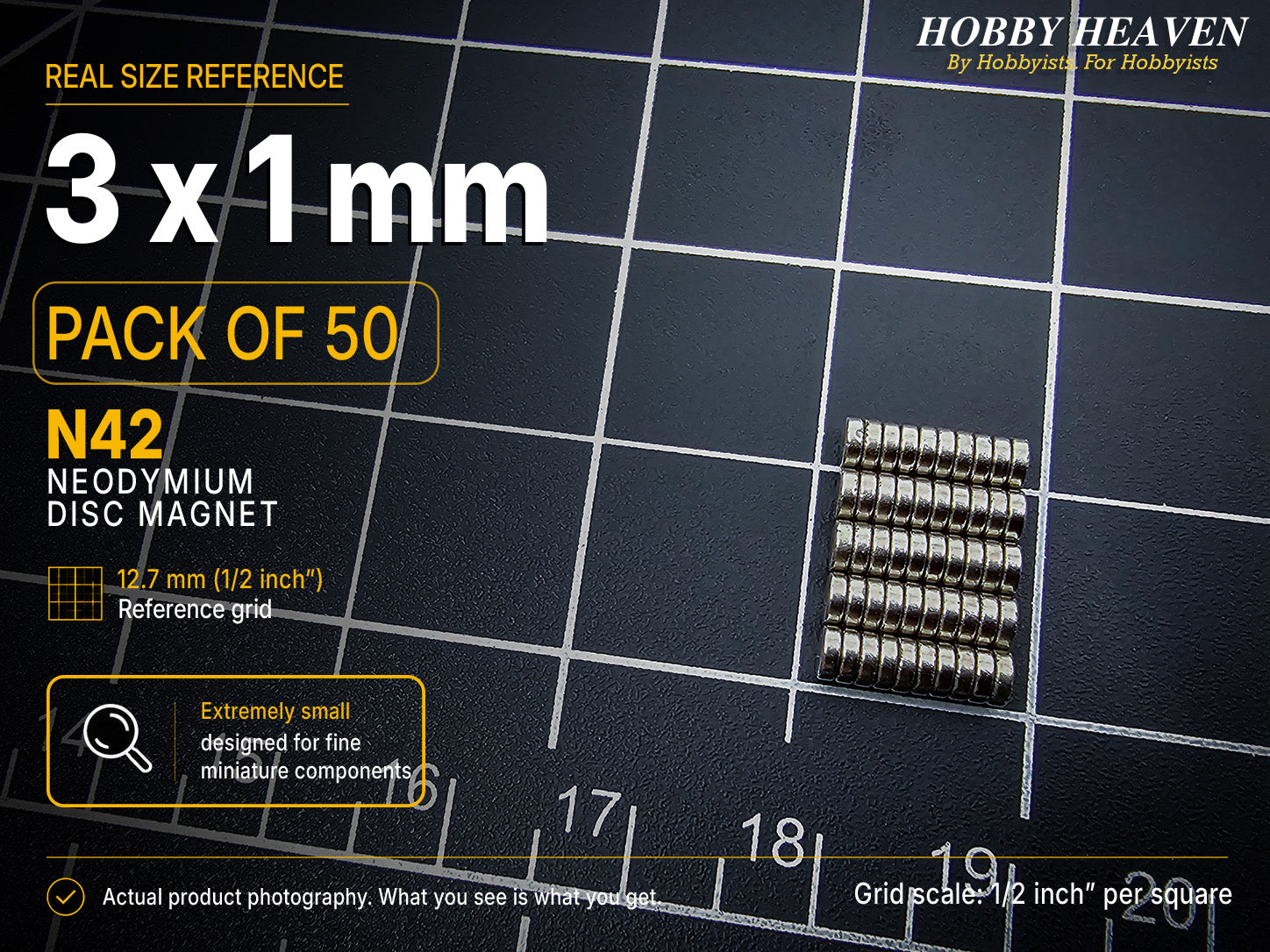 Pack of 50 - 3 x 1 mm N42 neodymium disc magnets in five stacked rows on a half-inch reference grid