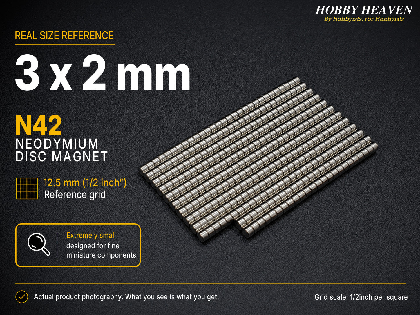 Stacked rows of 3 x 2 mm N42 neodymium disc magnets shown at real size on a half-inch reference grid