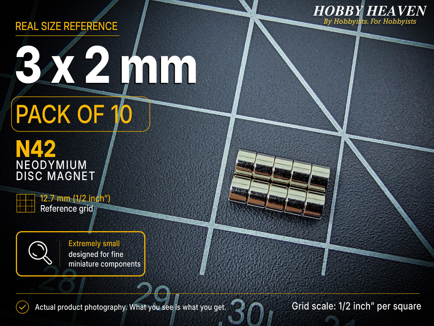 Pack of 10 - 3 x 2 mm N42 neodymium disc magnets in two stacked rows on a half-inch reference grid