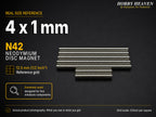 Stacked rows of 4 x 1 mm N42 neodymium disc magnets shown at real size on a half-inch reference grid