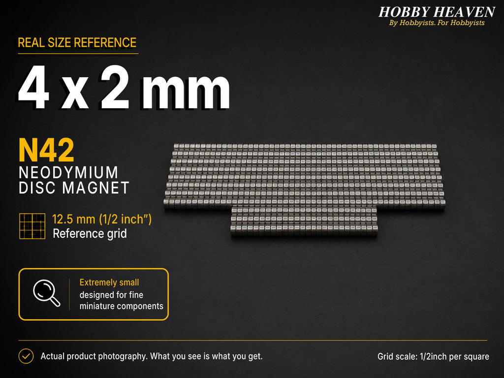 Stacked rows of 4 x 2 mm N42 neodymium disc magnets shown at real size on a half-inch reference grid