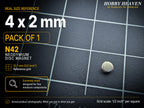 Pack of 1 - single 4 x 2 mm N42 neodymium disc magnet on a half-inch reference grid