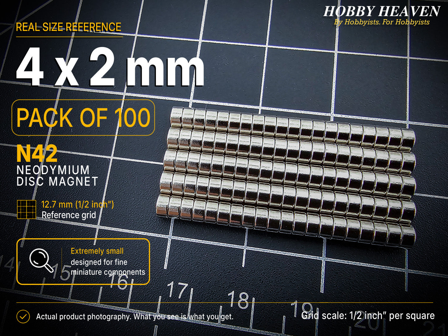 Pack of 100 - one hundred 4 x 2 mm N42 neodymium disc magnets in long stacked rows on a half-inch reference grid