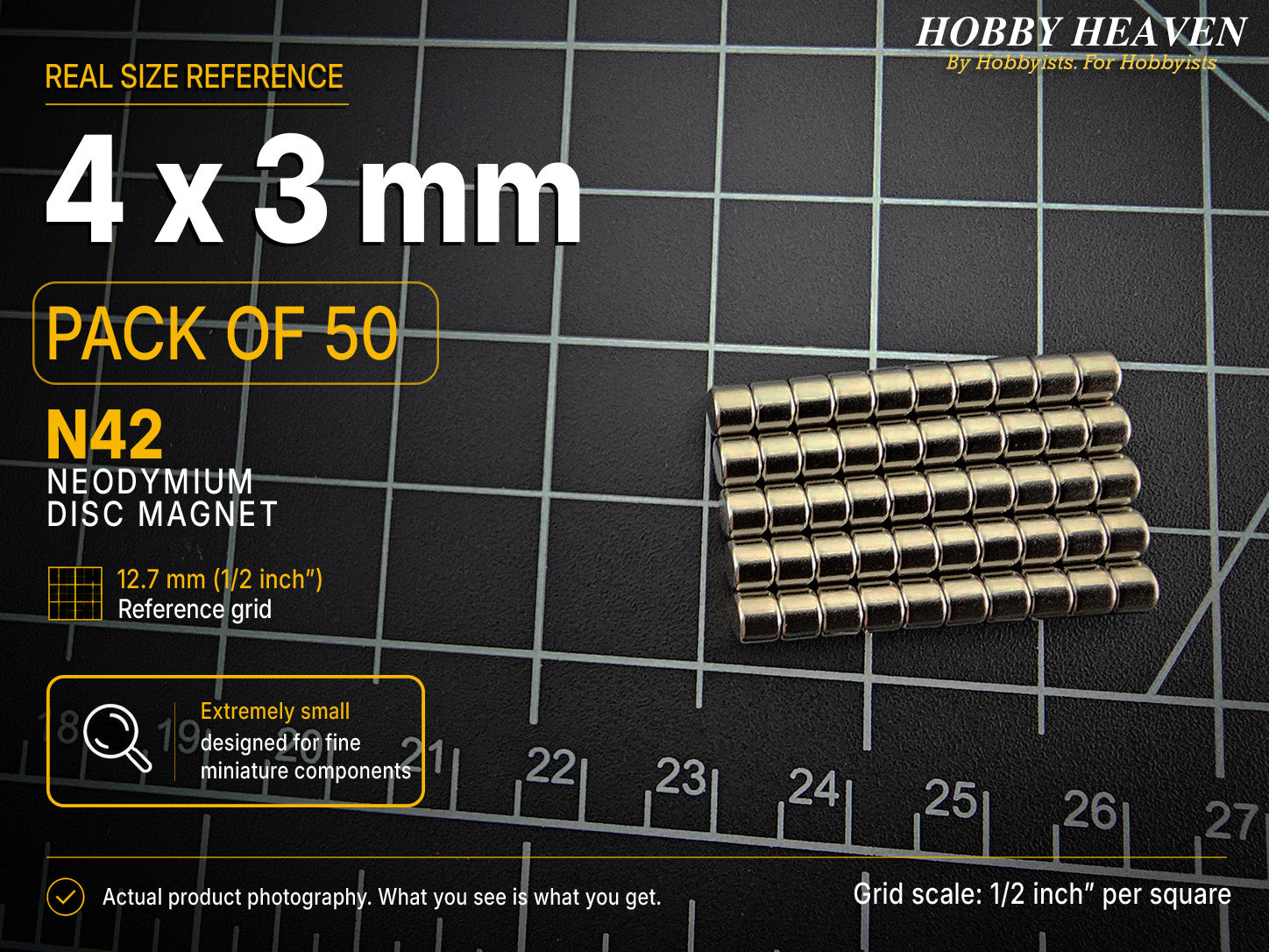Pack of 50 - 4 x 3 mm N42 neodymium disc magnets in stacked rows on a half-inch reference grid