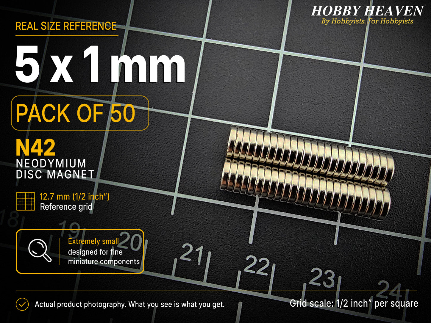 Pack of 50 - 5 x 1 mm N42 neodymium disc magnets in stacked rows on a half-inch reference grid