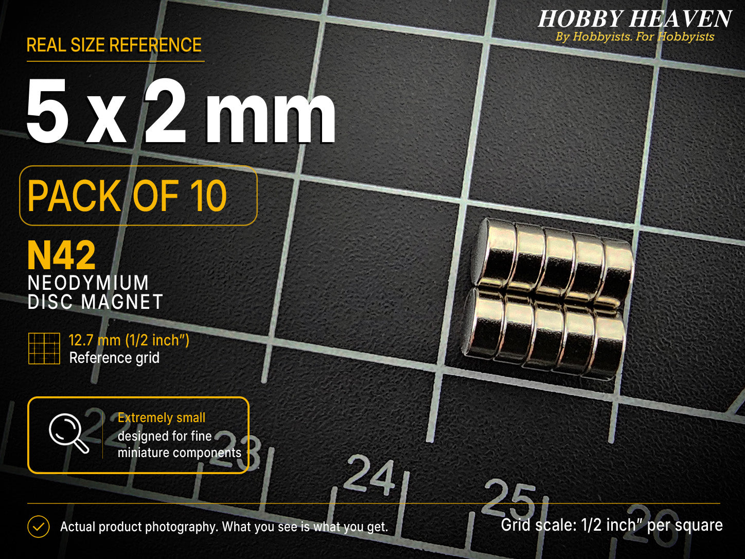 Pack of 10 - 5 x 2 mm N42 neodymium disc magnets in two short stacks on a half-inch reference grid