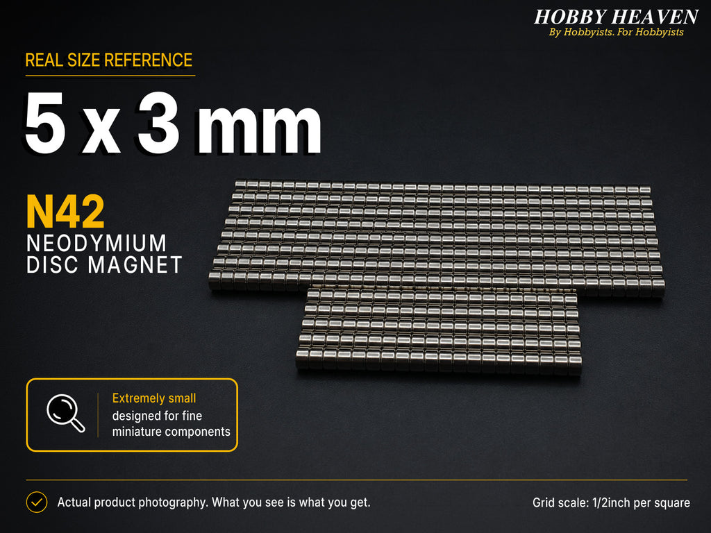 Stacked rows of 5 x 3 mm N42 neodymium disc magnets shown at real size on a half-inch reference grid