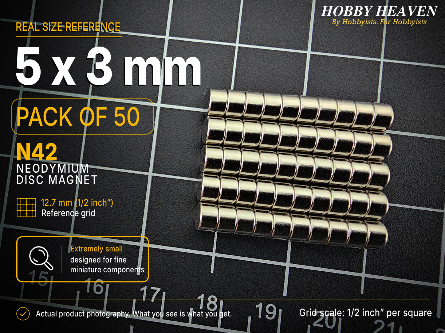 Pack of 50 - 5 x 3 mm N42 neodymium disc magnets in stacked rows on a half-inch reference grid