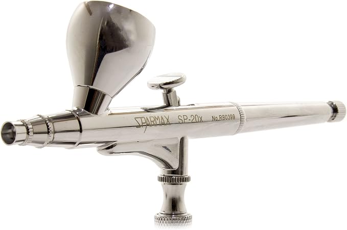 Sparmax SP-20X on white, side view showing the trigger, knurled needle nut and the engraved serial number