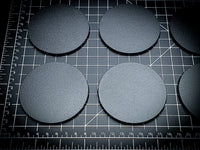 Detailed view of 80mm round bases with texture visible
