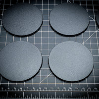 Detailed view of 80mm round bases with texture visible