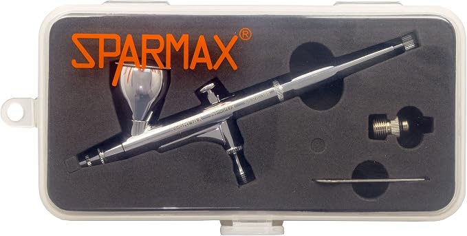 Sparmax SP-20X in its clear storage case with die-cut foam holding the airbrush, air valve and cleaning brush