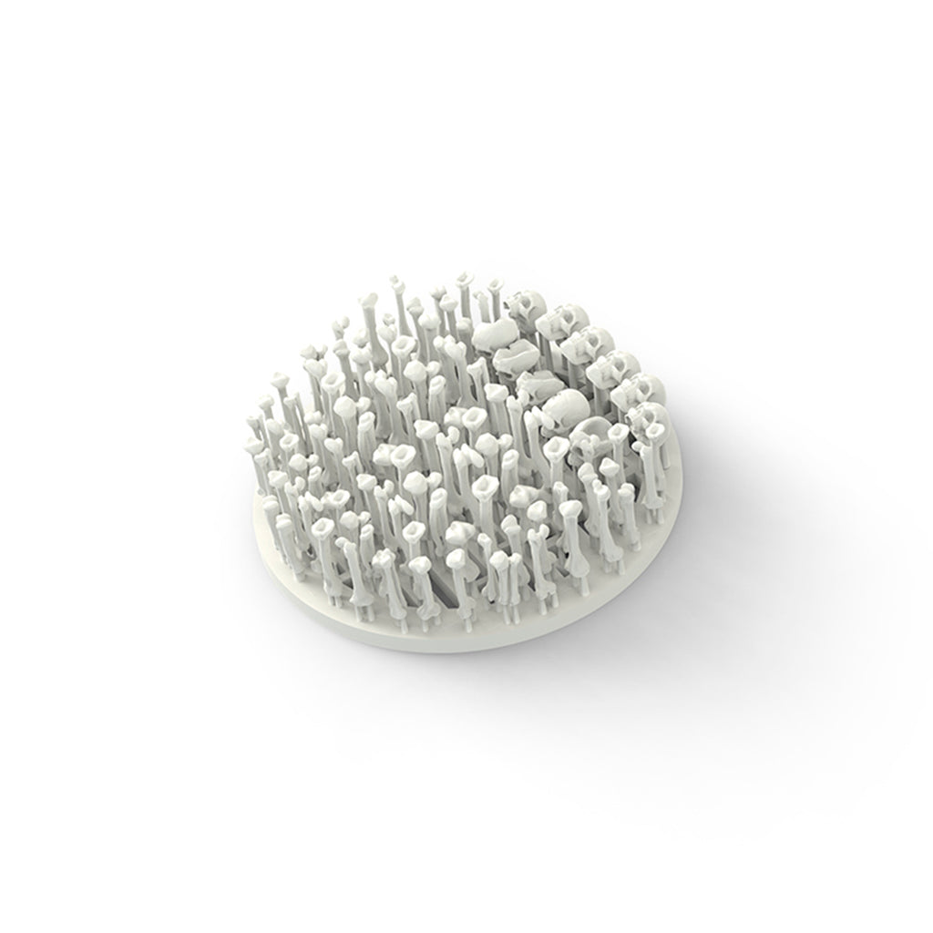 AK8310 bone fragments as supplied: skulls, ribs and long bones 3D printed upright on a round support raft