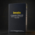Iwata Custom Micron outer box in black and gold, lettered Absolute Precision in English and Japanese