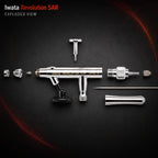 Exploded view of the Revolution SAR: nozzle cap, nozzle, body, needle, spring, comfort handle and bottle adaptor