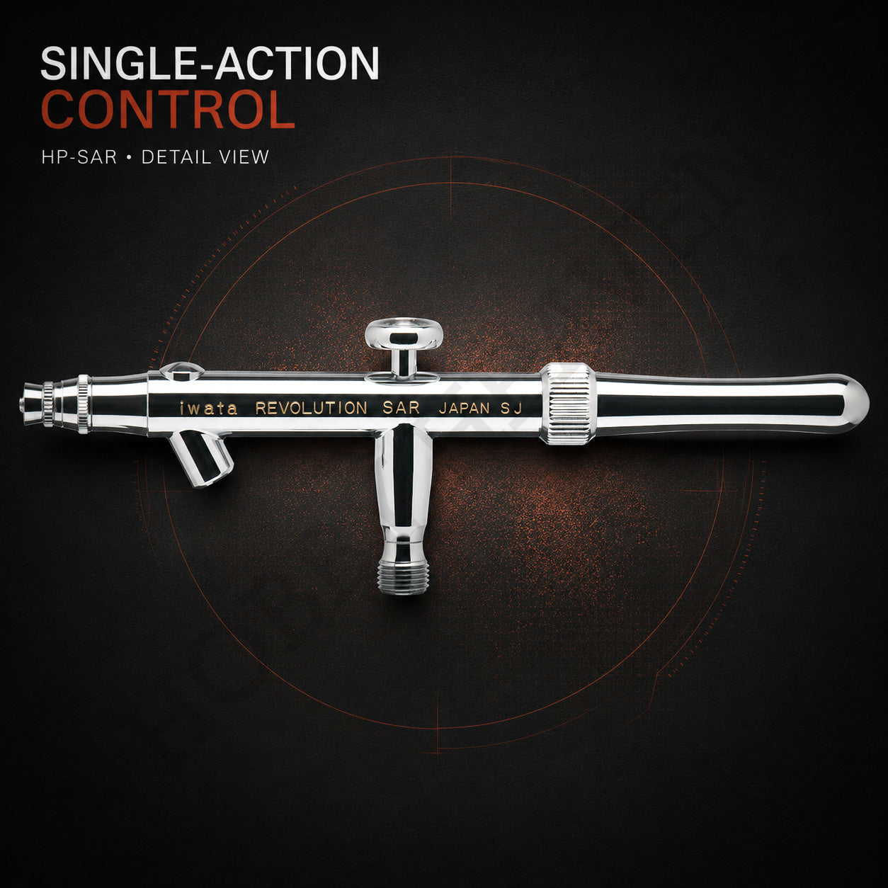 Close-up of the Revolution SAR single-action trigger and knurled needle-chucking nut, shown without the bottle