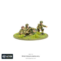 British Airborne heavy weapons team miniatures equipped with machine guns for WWII wargaming scenarios.


