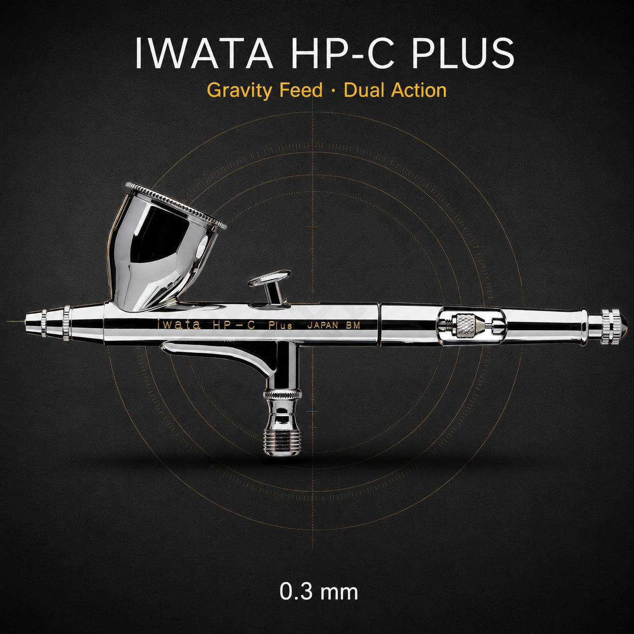 Iwata HP-C Plus airbrush side-on against black, 7 ml gravity cup uppermost, engraved iwata HP-C Plus JAPAN