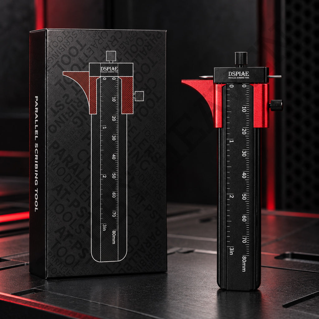 DSPIAE AT-PST parallel scribing tool standing beside its black retail box, red guide on a 0–80 mm rule