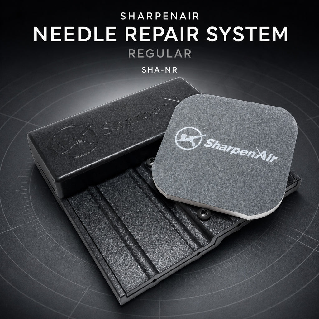 SharpenAir needle repair tool in matte black with its embossed logo, shown with the grey 3000 grit polishing pad