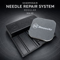 SharpenAir needle repair tool in matte black with its embossed logo, shown with the grey 3000 grit polishing pad