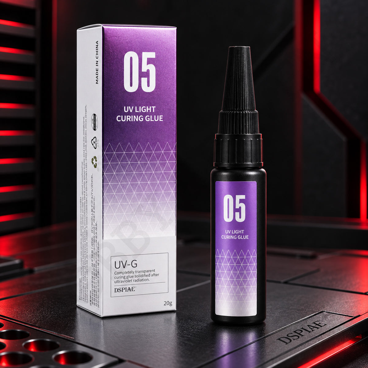 DSPIAE UV-G UV light curing glue: black 20 g bottle with a tapered nozzle cap beside its purple 05 box