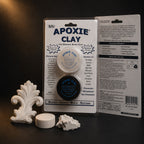 Aves Apoxie Clay quarter-pound White blister card with both jars, a cured white ornament, disc and torn lump