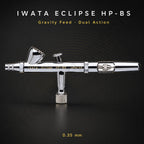 Iwata Eclipse HP-BS shown full length against dark grey, cutaway handle and trigger in view