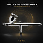 Iwata Revolution CR airbrush side-on against black, lidded 7 ml gravity cup, engraved iwata REVOLUTION CR