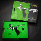 Neo for Iwata TRN1 in its open green box with the second, smaller fluid cup in its own recess