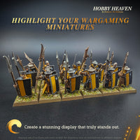 Highlight your wargaming miniatures" banner featuring a detailed painted figure, promoting Hobby Heaven products for creating stunning and standout displays. Ideal for hobbyists seeking high-quality bases for their miniature collections.
