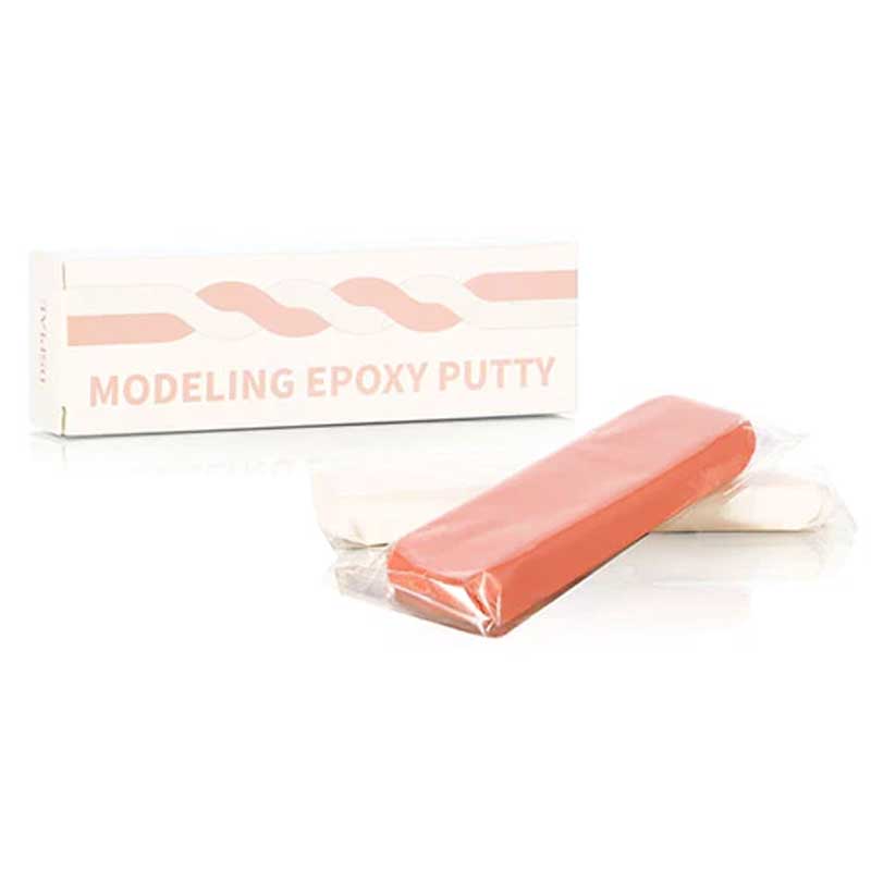 DSPIAE MEP-01 skin-coloured epoxy putty box with its two wrapped bars on white