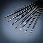 Range of Series 7 Miniature brush sizes showcased against dark backdrop