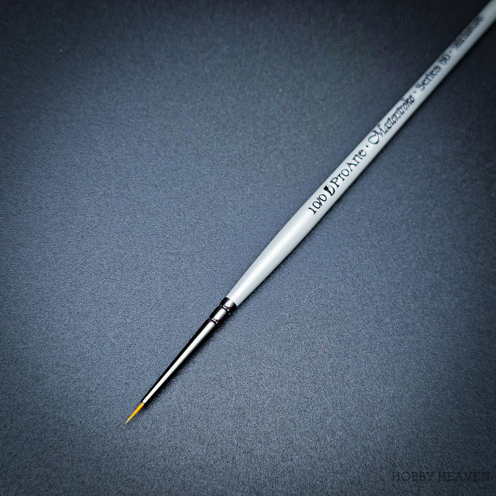  Pro Arte Masterstroke Series 60 – Close-up of size 10/0 Prolon Round Brush on black background.