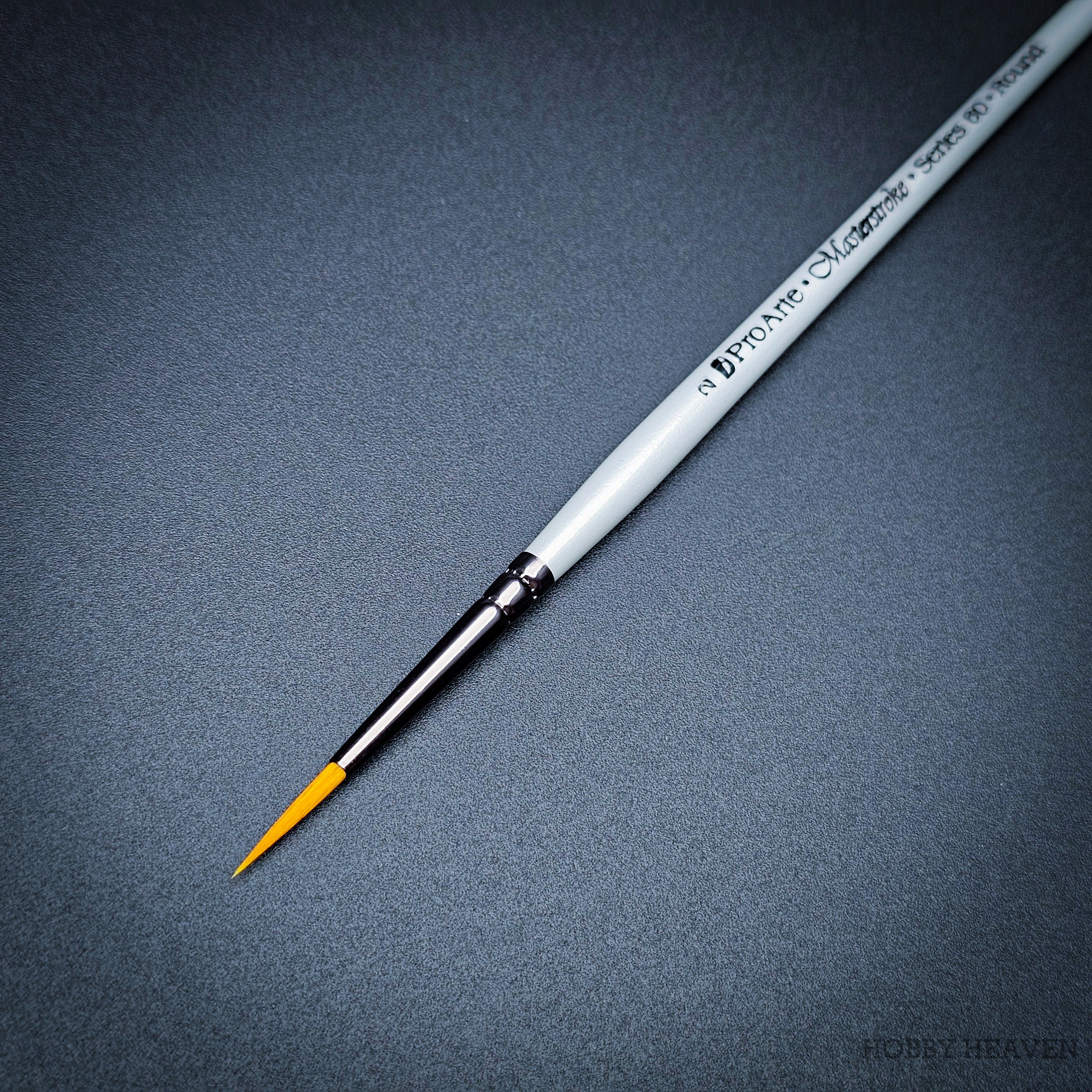 Pro Arte Masterstroke Series 60 – Close-up of size 2 Prolon Round Brush on black background.