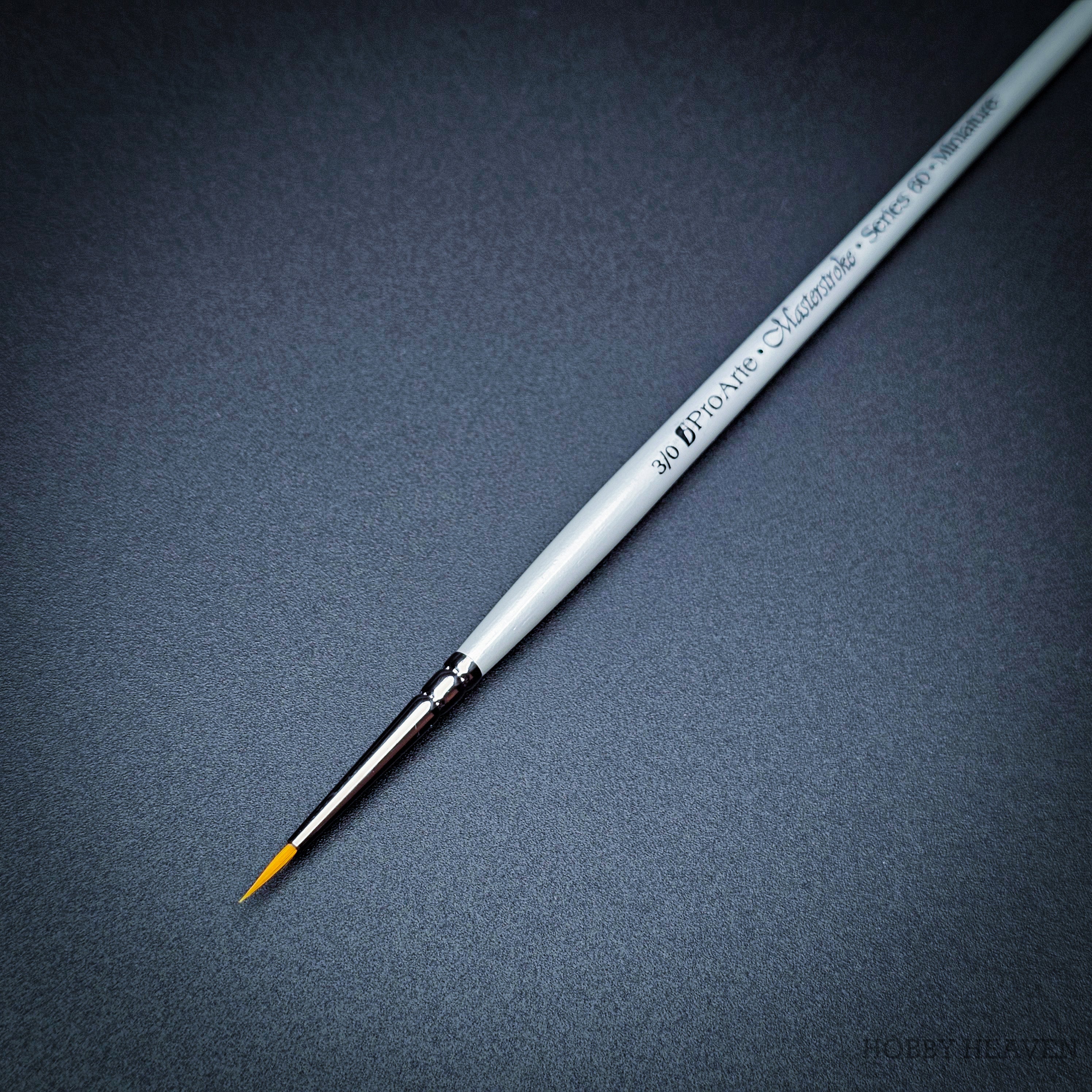 Pro Arte Masterstroke Series 60 – Close-up of size 3/0 Prolon Round Brush on black background.