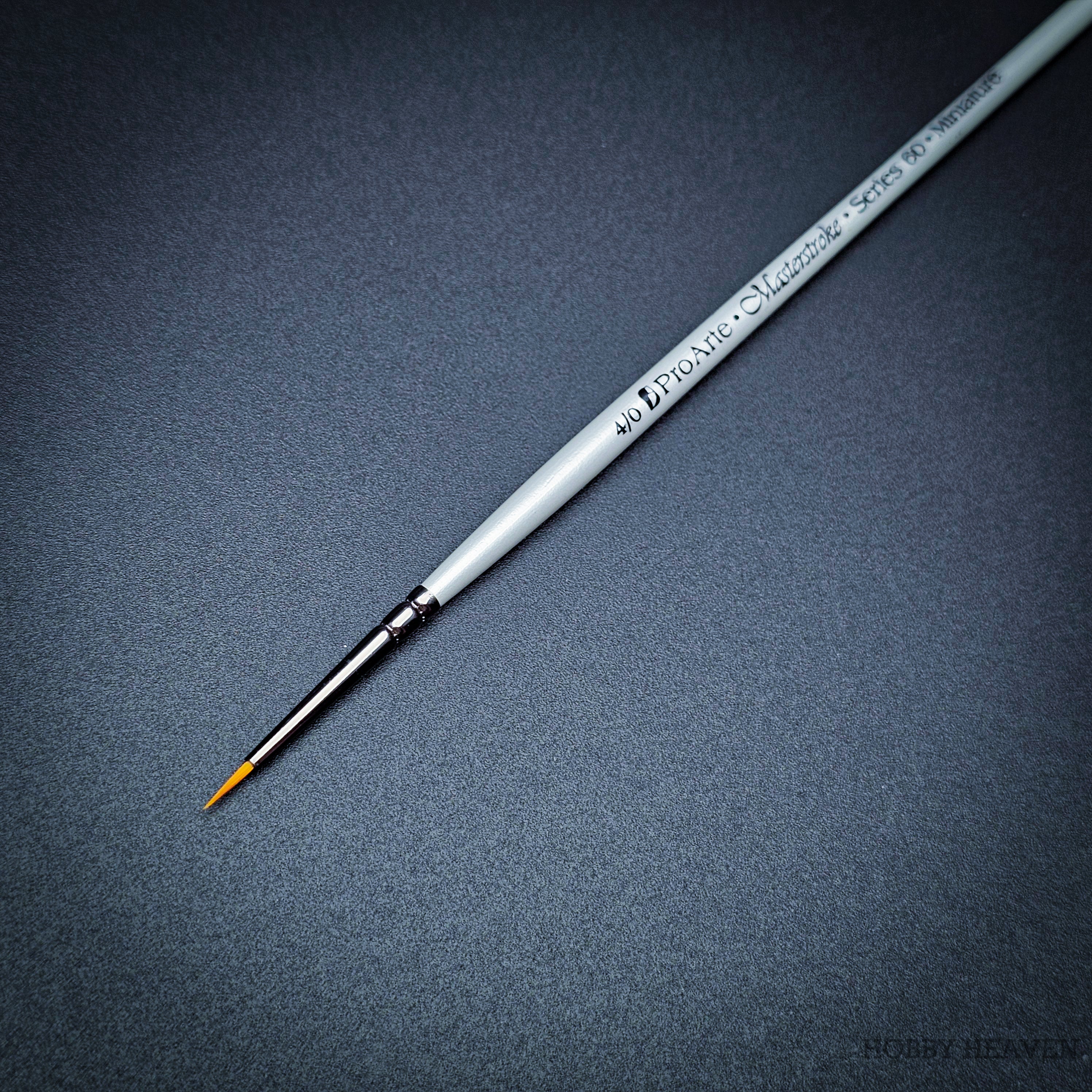  Pro Arte Masterstroke Series 60 – Close-up of size 4/0 Prolon Round Brush on black background.