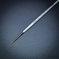  Pro Arte Masterstroke Series 60 – Close-up of size 4/0 Prolon Round Brush on black background.
