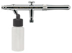 Iwata Revolution SAR on white with the 30 ml bottle screwed into the siphon inlet, full side view