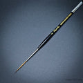 Raphael Kolinsky Sable Brush 88026 – Close-up of size 2, fine detail long tip liner on black background.
