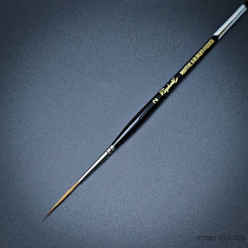 Raphael Kolinsky Sable Brush 88026 – Close-up of size 2, fine detail long tip liner on black background.